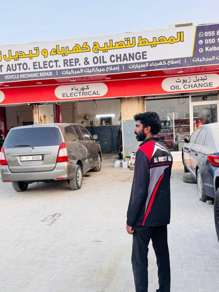 Al Muheet Auto technician at Oil Change and Electrical service bay in Kalba